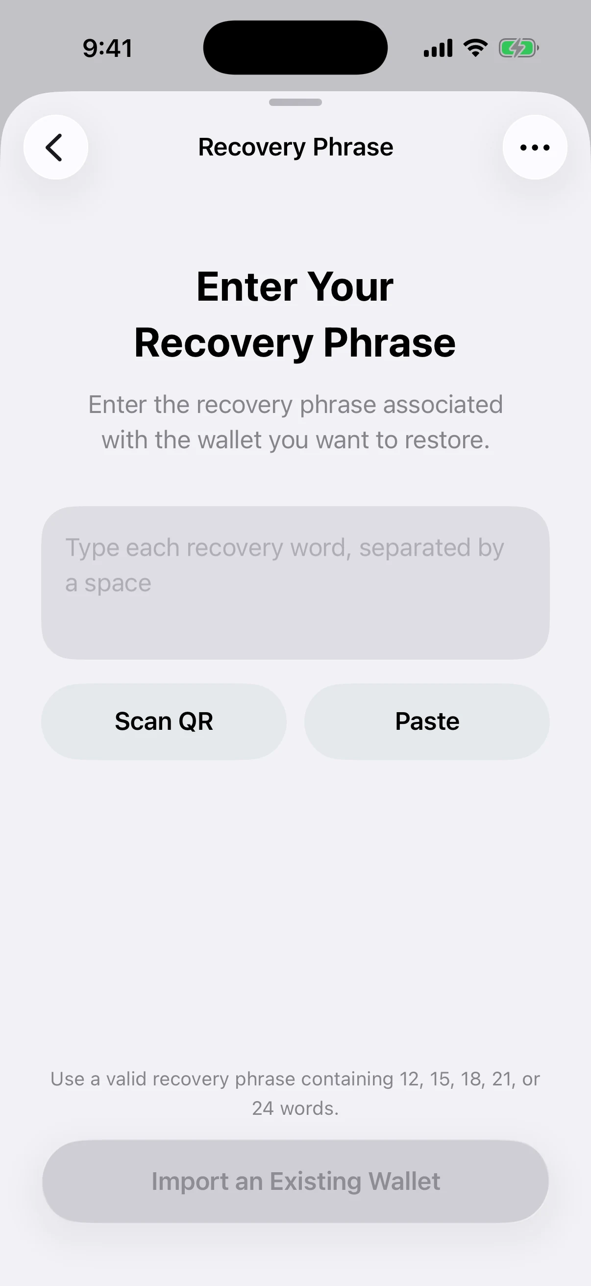 Real Aperture Recovery Phrase import screen in the iOS Simulator with empty secure entry, Scan QR, Paste, and BIP-39 tools