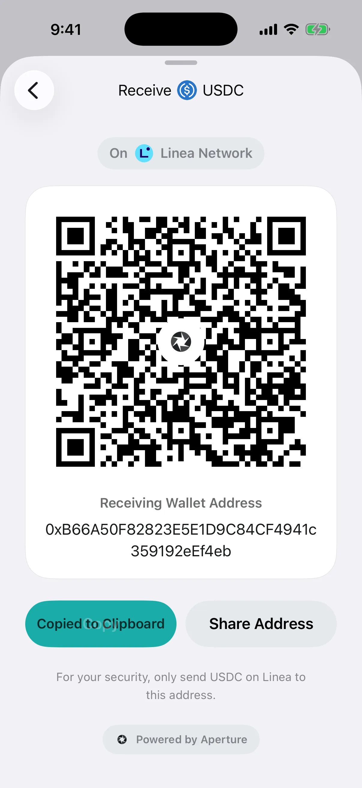 Real Aperture USDC receive card in the iOS Simulator confirming the address was copied to the clipboard